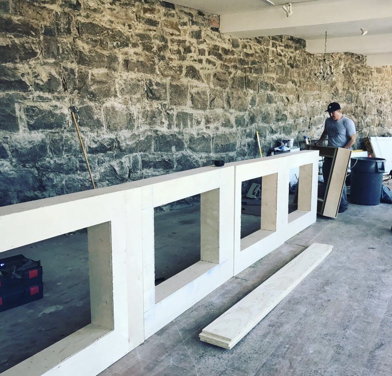 The Flip Side bar carcass framed and built in place against the original stone wall